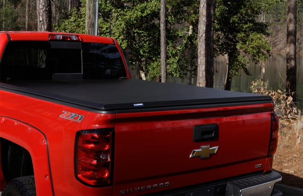 Lund 09-14 fits Ford F-150 Styleside (5.5ft. Bed) Hard Fold Tonneau Cover - Black