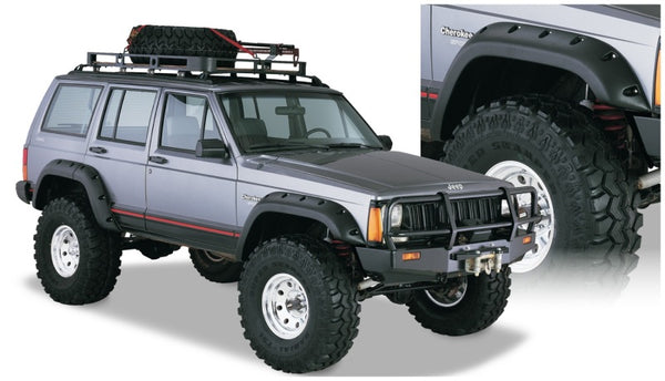 Bushwacker 84-01 fits Jeep Cherokee Cutout Style Flares 4pc Fits 4-Door Sport Utility Only - Black