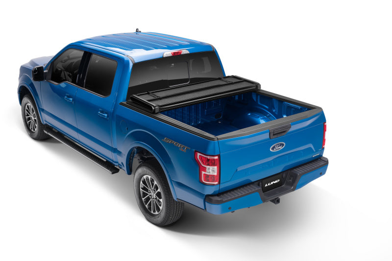 Lund 99-17 fits Ford F-250 Super Duty Styleside (6.8ft. Bed) Hard Fold Tonneau Cover - Black
