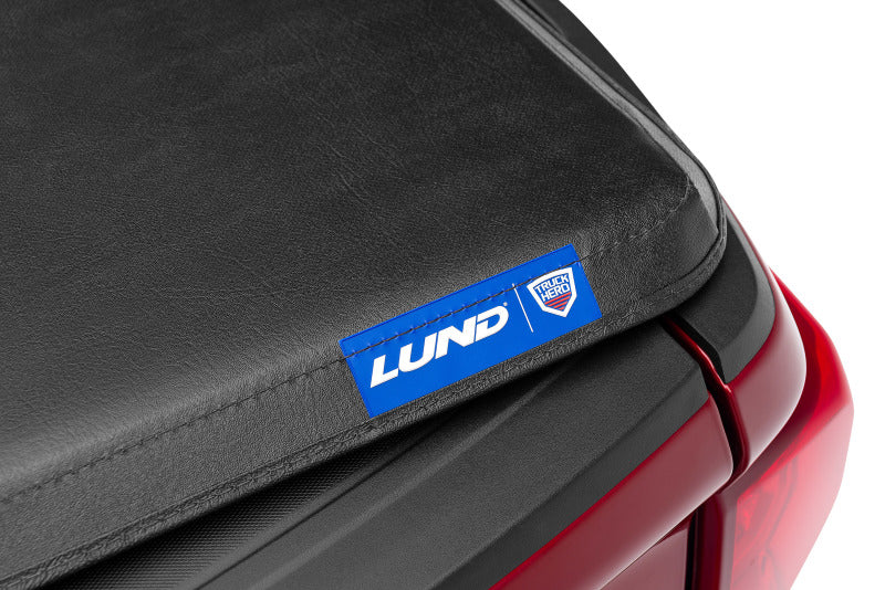 Lund 05-15 fits Toyota Tacoma Fleetside (6ft. Bed) Hard Fold Tonneau Cover - Black
