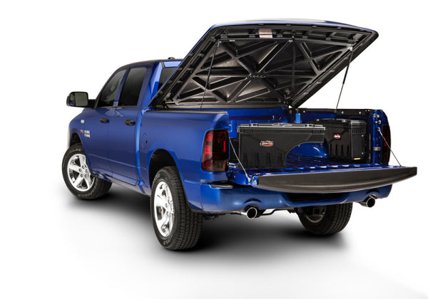 UnderCover 2022 fits Nissan Frontier Ext/Crew All Beds Drivers Side Swing Case - Black Smooth